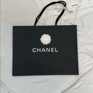 Chanel black shopping paper bag